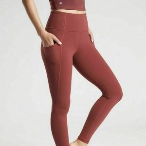 Athleta Stash pocket salutation tight 198877